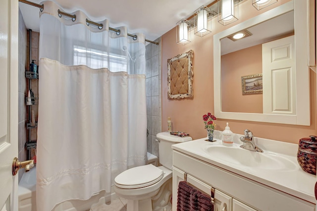 full bathroom featuring toilet, vanity, shower / bath combination with curtain, and tile patterned floors