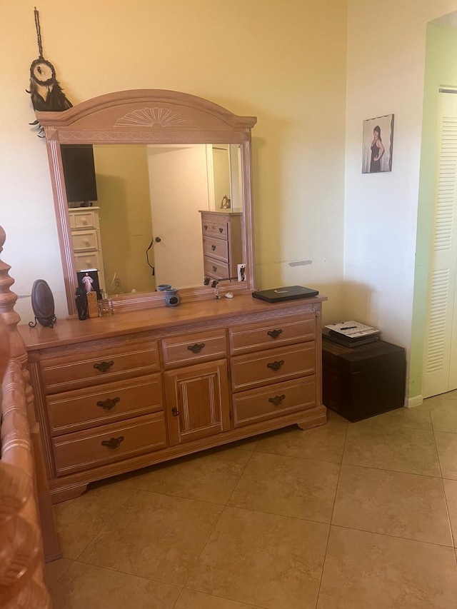 bathroom featuring tile flooring