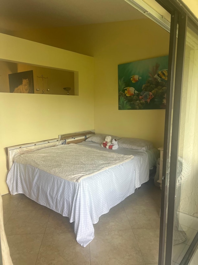 bedroom with tile flooring