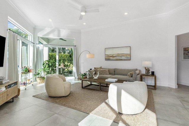 tiled living room with ceiling fan and crown molding