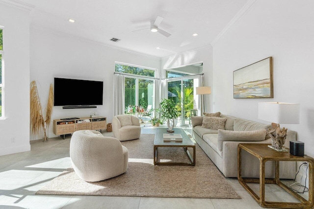 living room featuring ornamental molding, ceiling fan, and light tile floors