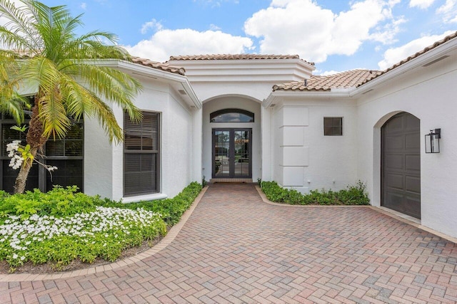 view of exterior entry with french doors