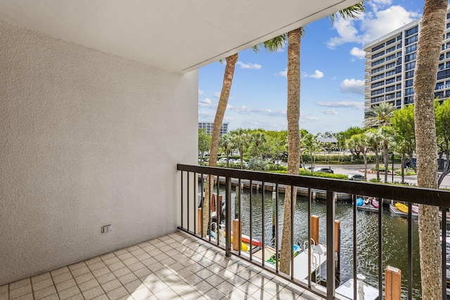 balcony featuring a water view