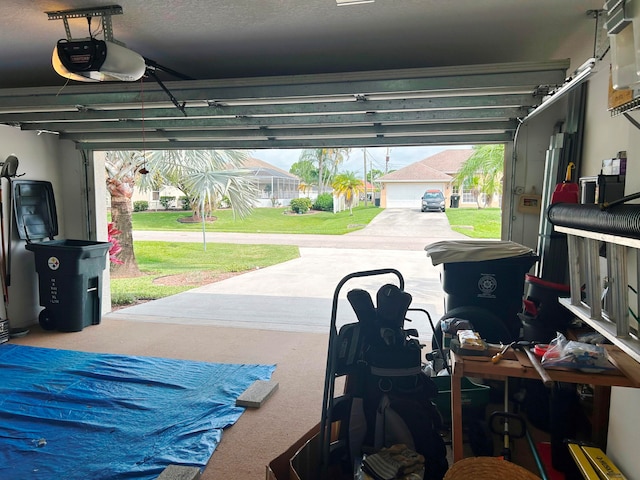 garage featuring a garage door opener