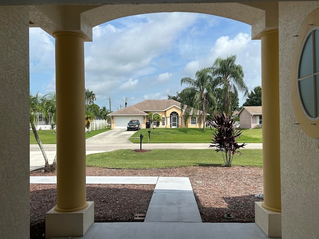 view of yard with a garage