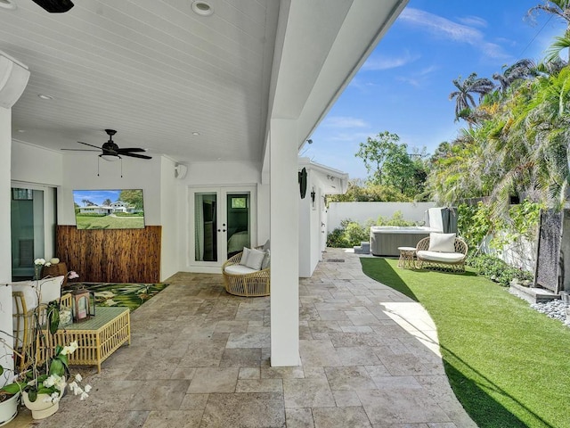 view of patio / terrace with french doors and ceiling fan