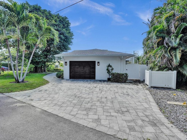 garage with a yard