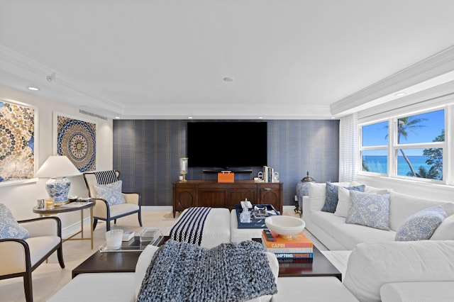 living room with ornamental molding and a water view