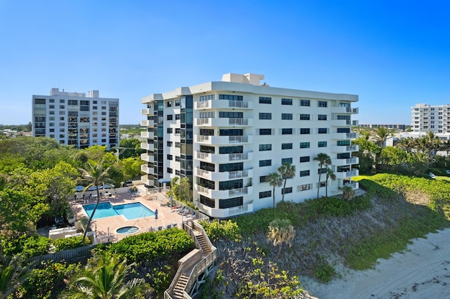 view of property with a community pool