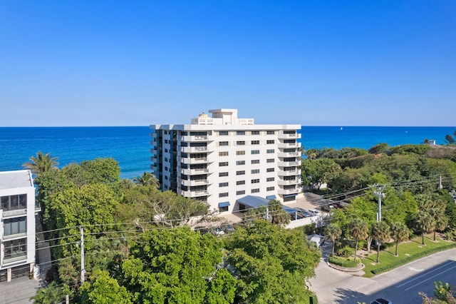 view of building exterior with a water view