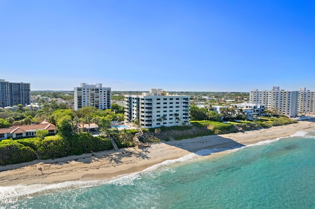 bird's eye view with a view of the beach and a water view