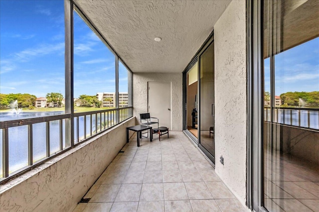 balcony featuring a water view