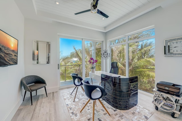 home office with ceiling fan and light hardwood / wood-style floors