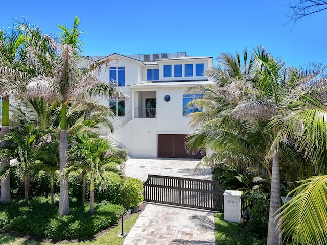 view of front of property featuring a garage