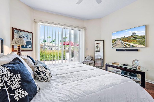 bedroom with hardwood / wood-style floors and ceiling fan