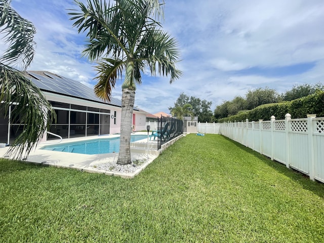 view of yard featuring a fenced in pool