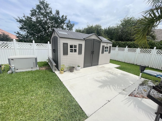 view of outbuilding featuring a yard