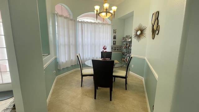 dining space featuring a chandelier