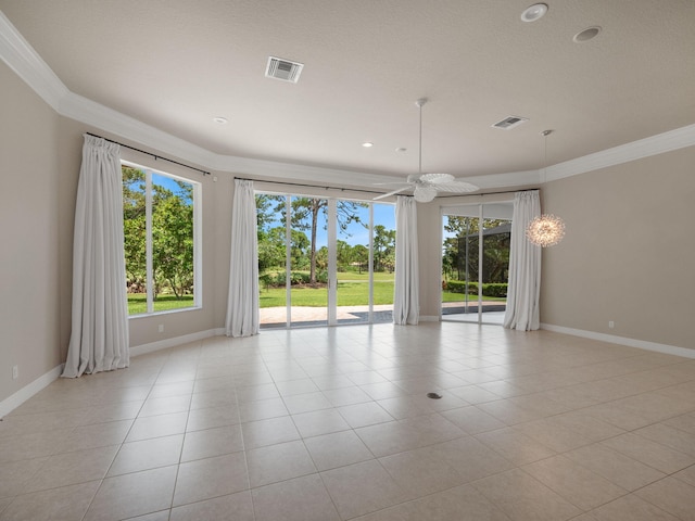 empty room featuring plenty of natural light, light tile patterned flooring, and ornamental molding