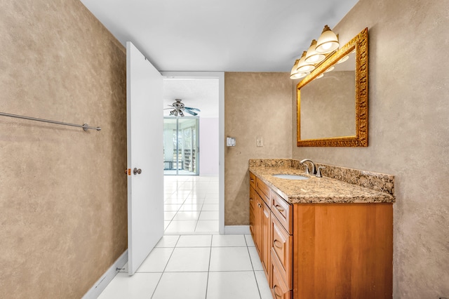 bathroom with vanity, ceiling fan, and tile patterned floors