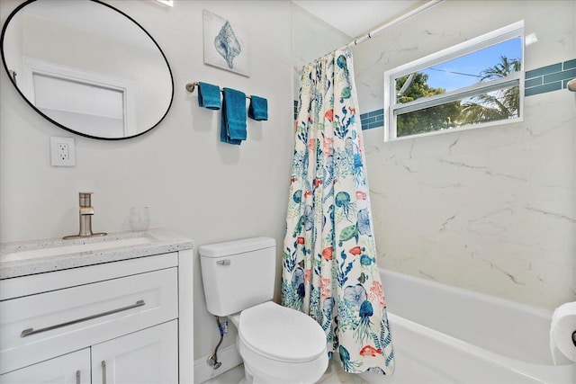 full bathroom with toilet, vanity, and shower / bath combo with shower curtain