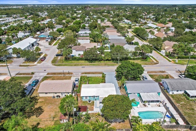 birds eye view of property with a residential view