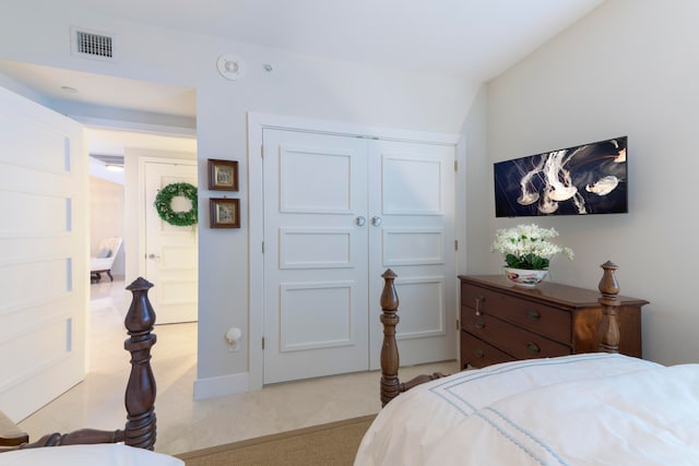 carpeted bedroom featuring a closet