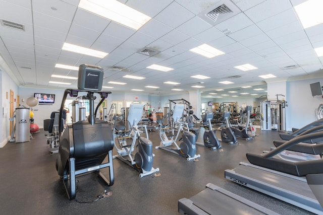 workout area with a paneled ceiling