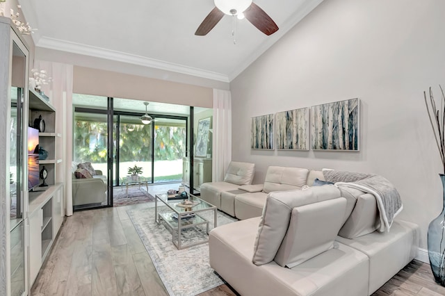 living room with high vaulted ceiling, hardwood / wood-style floors, ceiling fan, and crown molding