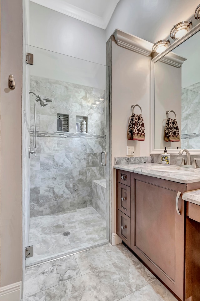 bathroom with tile floors, ornamental molding, an enclosed shower, and large vanity