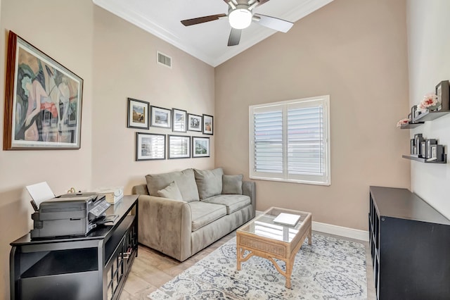 living room featuring high vaulted ceiling, light hardwood / wood-style floors, ornamental molding, and ceiling fan