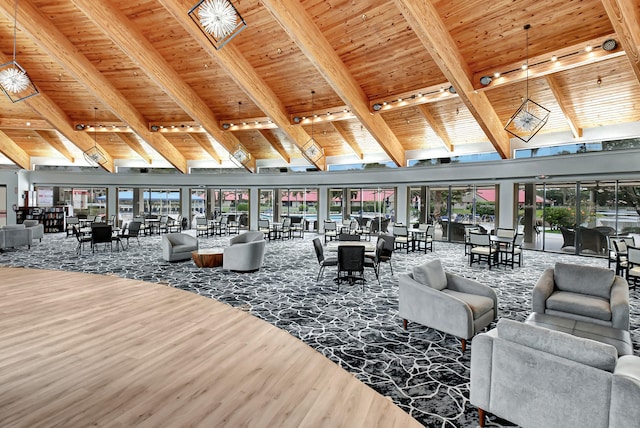 living room with beamed ceiling, high vaulted ceiling, wood-type flooring, and wooden ceiling