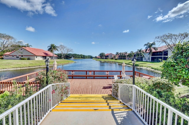 exterior space with a water view