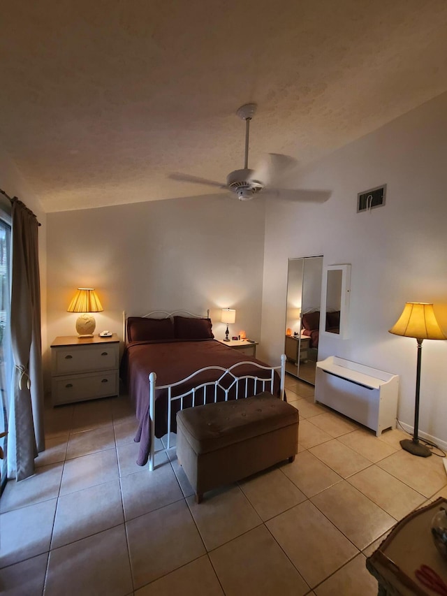 bedroom featuring tile flooring and ceiling fan