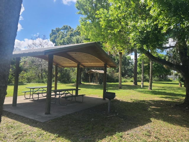 view of home's community featuring a lawn and a gazebo