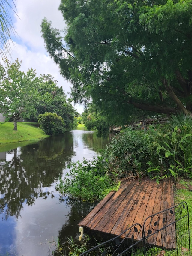 view of dock with a water view