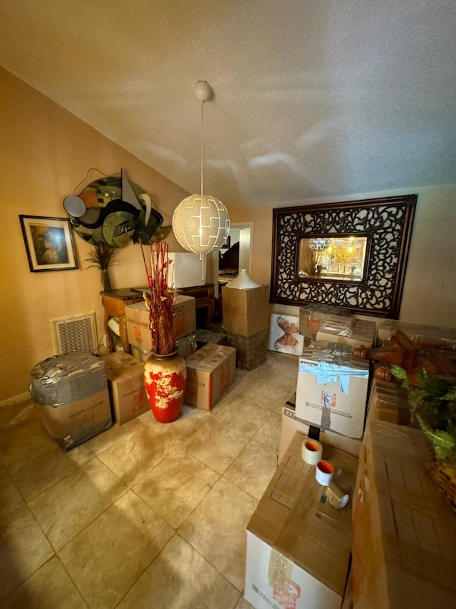 dining area with a textured ceiling