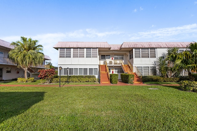 view of front of home with a front yard