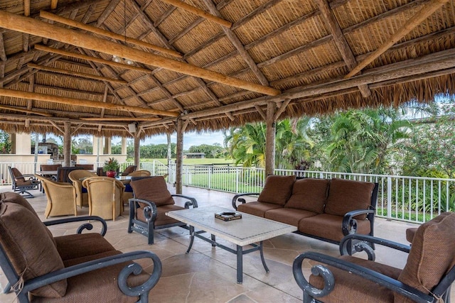 view of terrace with a gazebo and an outdoor hangout area