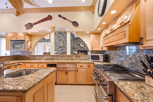 kitchen with beamed ceiling, appliances with stainless steel finishes, premium range hood, light stone counters, and tasteful backsplash