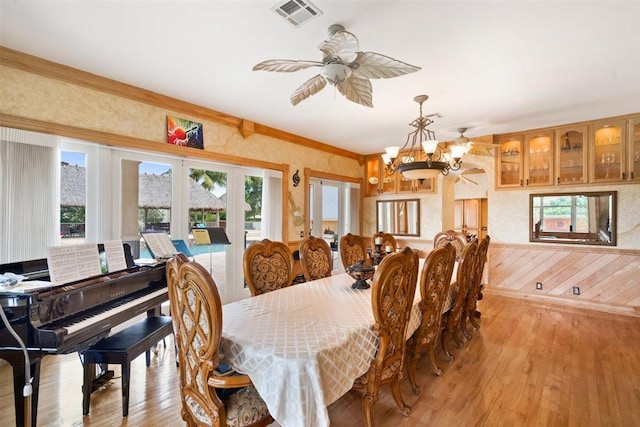 dining room featuring a healthy amount of sunlight and light wood-type flooring