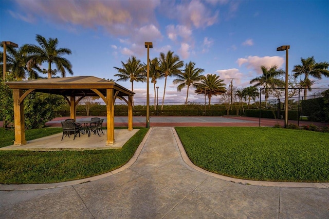 surrounding community with a lawn and a gazebo