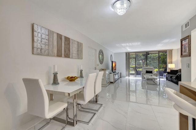 dining room with expansive windows