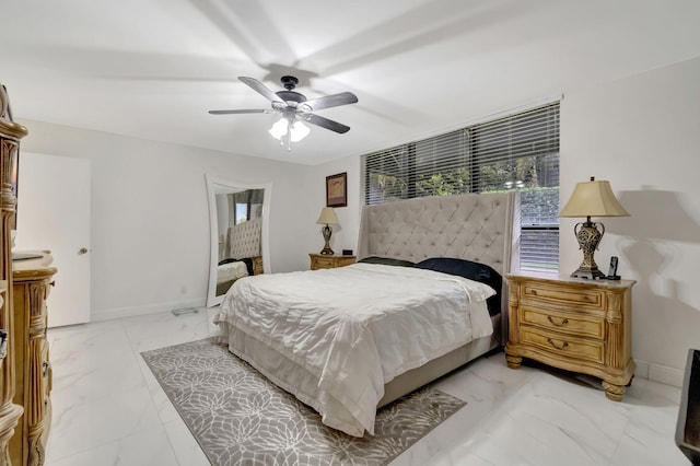 bedroom featuring ceiling fan