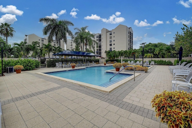 view of swimming pool with a patio