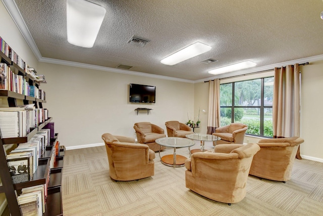 living room with a textured ceiling, carpet flooring, and crown molding