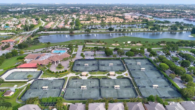 birds eye view of property featuring a water view