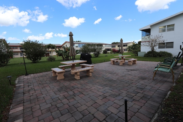 view of patio featuring a fire pit