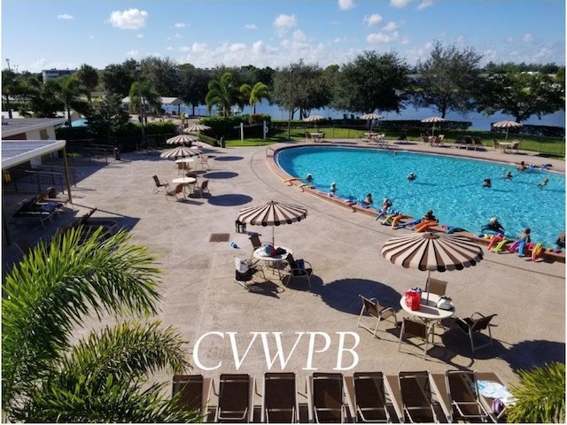 view of swimming pool with a patio area