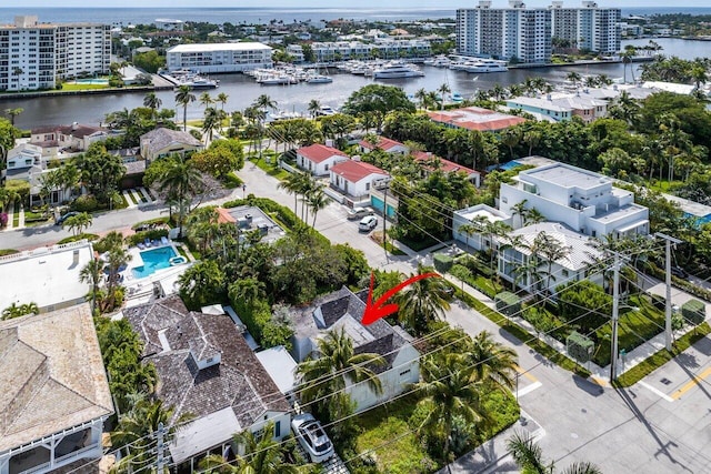 birds eye view of property featuring a water view